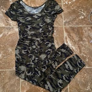 A green camouflage jumpsuit in a size XL.